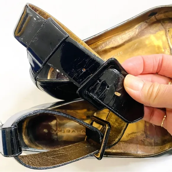 Barbara BUI black and gold patent leather buckle ankle flats
