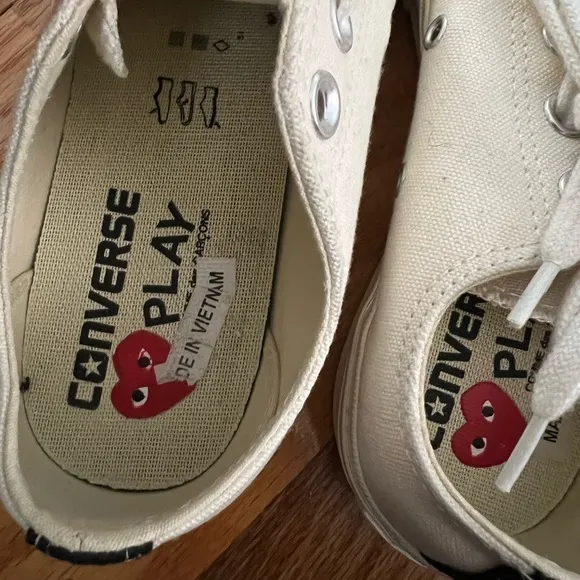 Comme des Garçon PLAY x Converse Low Top Chuck Taylor Sneakers