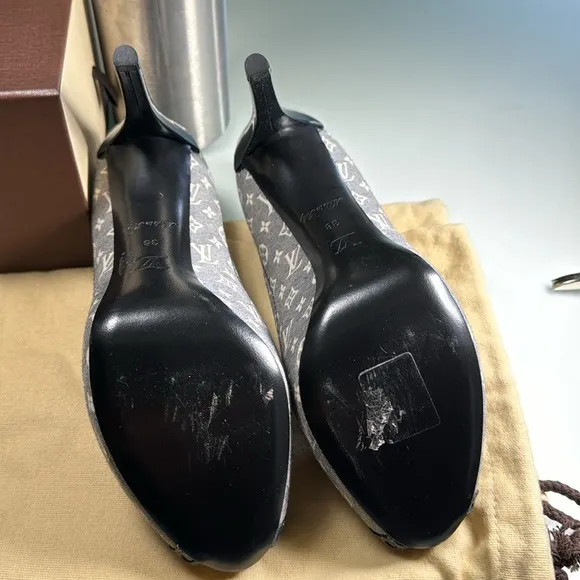COPY - Louis Vuitton Romance peep toe pumps.