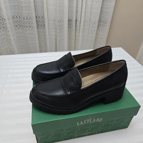 Eastland Black Flats and Loafers with Classic Penny Design