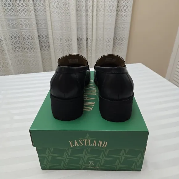 Eastland Black Flats and Loafers with Classic Penny Design