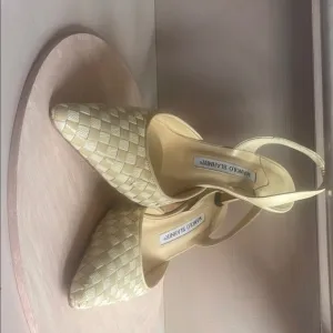 Manolo Blahnik Cream Textured Heels with Buckle Strap