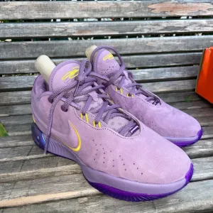 Nike Purple and Yellow Athletic Shoes Mid-Top Design
