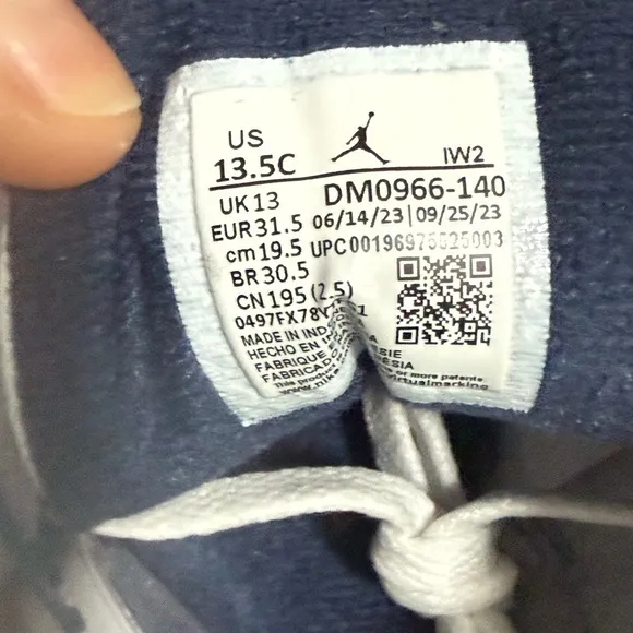 Nike White and Gray Sneakers with Classic Design