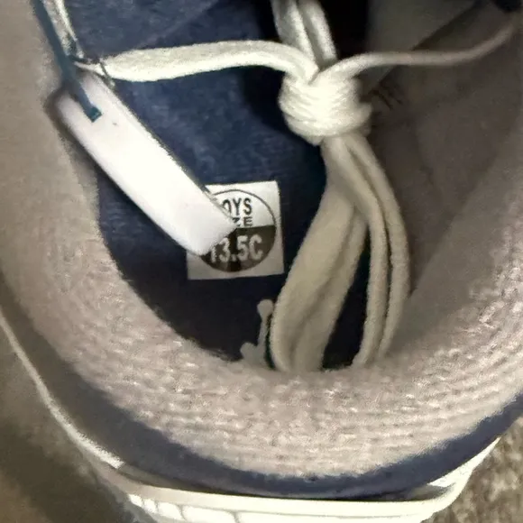 Nike White and Gray Sneakers with Classic Design