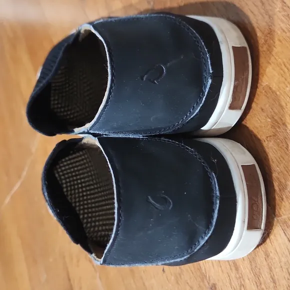 OluKai black slip on shoes