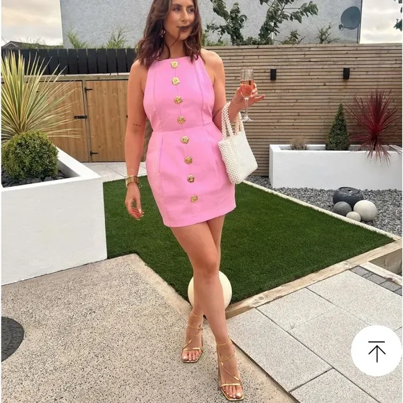 Pink mini dress with gold flower detail buttons