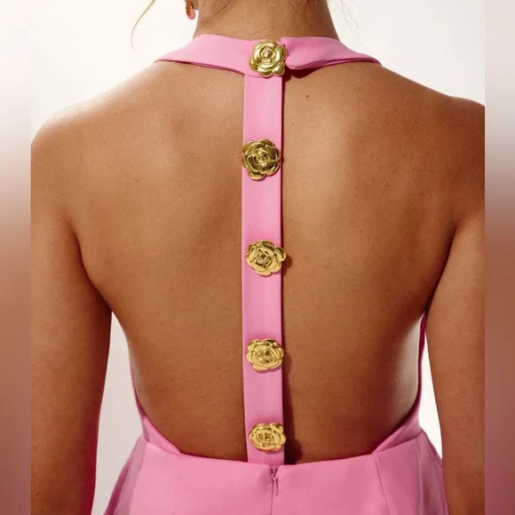 Pink mini dress with gold flower detail buttons