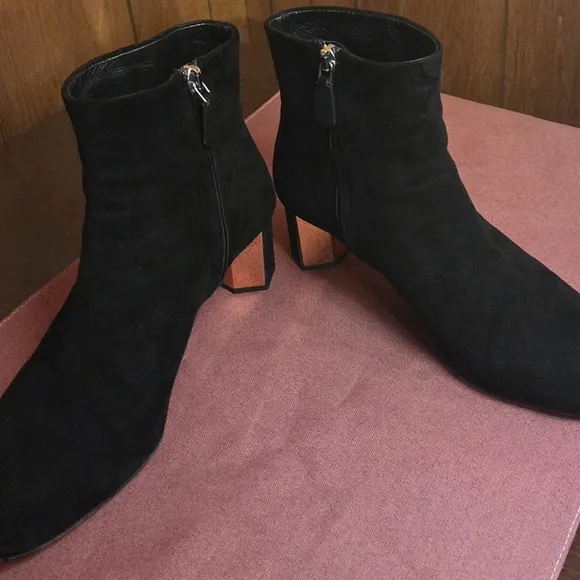 Prada Black Heeled Boots with Sleek Design