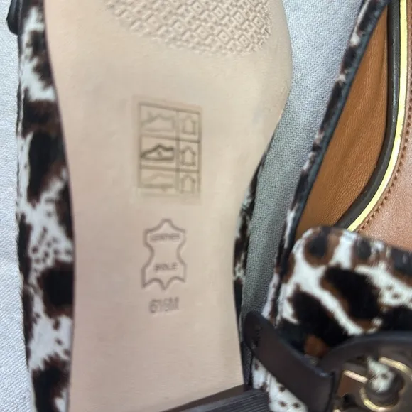 Tory Burch Leopard Patent Leather Black and White Flats with Gold Hardware.