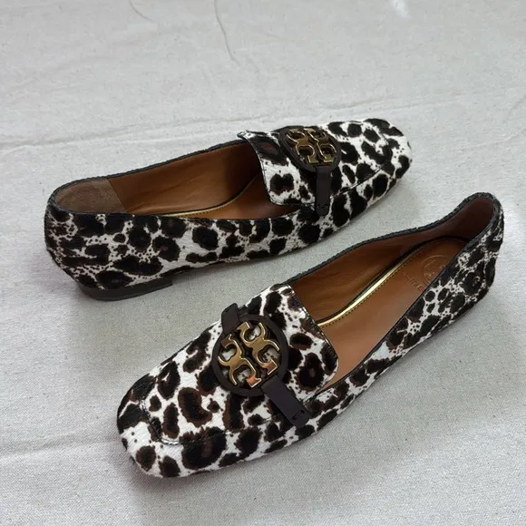 Tory Burch Leopard Patent Leather Black and White Flats with Gold Hardware.