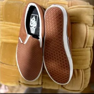 Vans Brown Slip-On Sneakers with Textured Finish