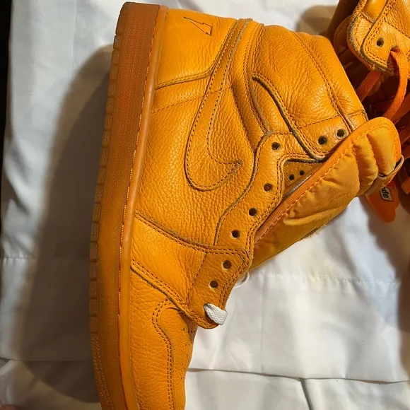Vibrant Orange High-Top Sneakers in great condition size 11 can’t go wrong
