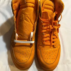 Vibrant Orange High-Top Sneakers in great condition size 11 can’t go wrong