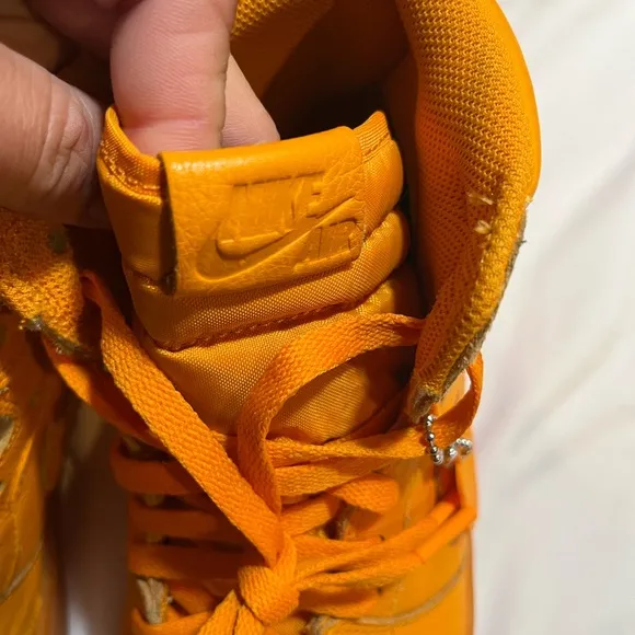 Vibrant Orange High-Top Sneakers in great condition size 11 can’t go wrong