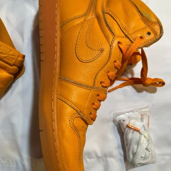 Vibrant Orange High-Top Sneakers in great condition size 11 can’t go wrong