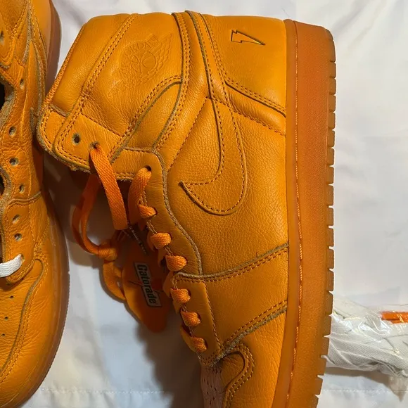Vibrant Orange High-Top Sneakers in great condition size 11 can’t go wrong