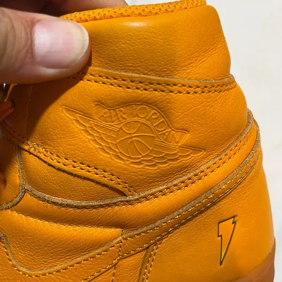 Vibrant Orange High-Top Sneakers in great condition size 11 can’t go wrong